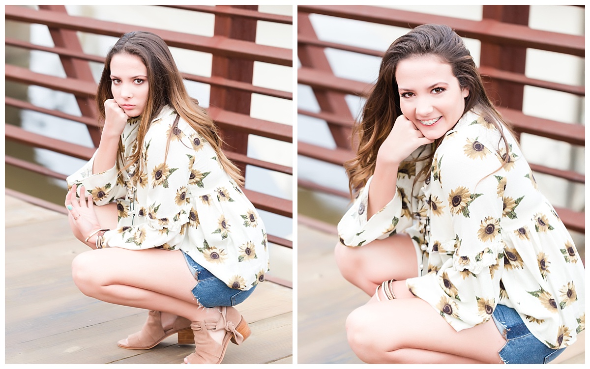 senior girl kneeling on walking bridge