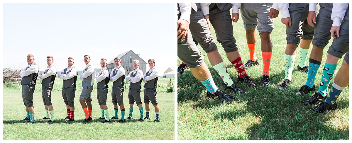 groomsmen standing showing off colorful socks