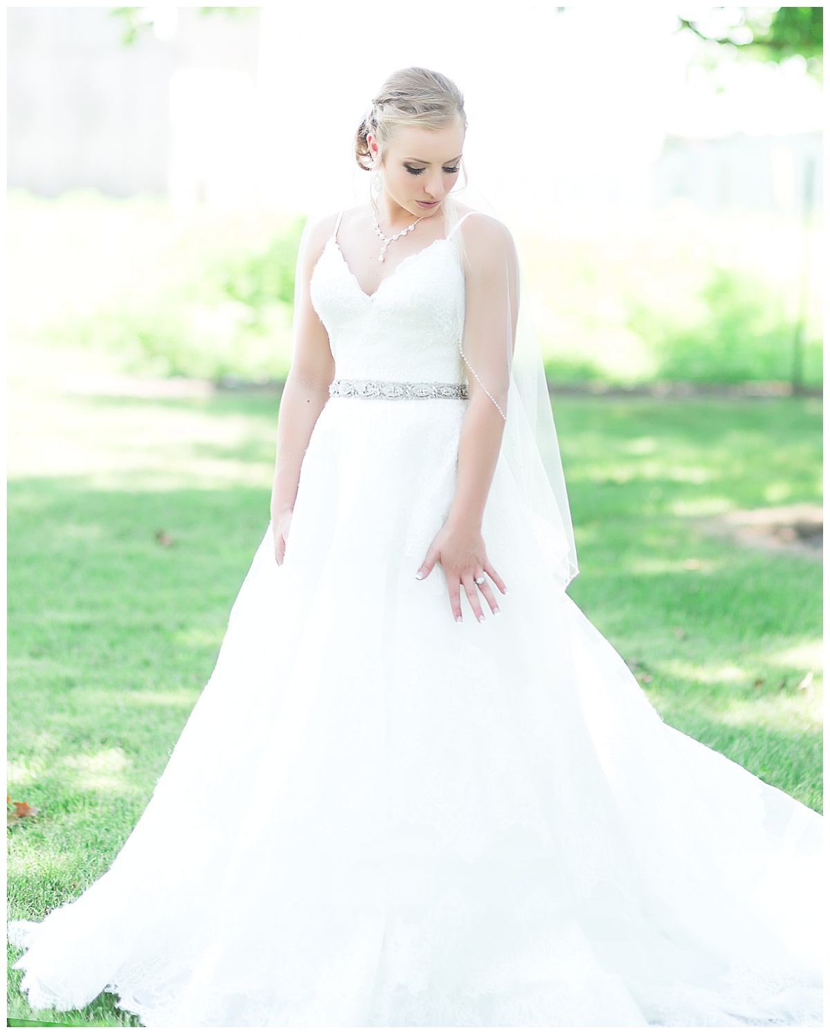 wedding day bride in ball gown style wedding gown