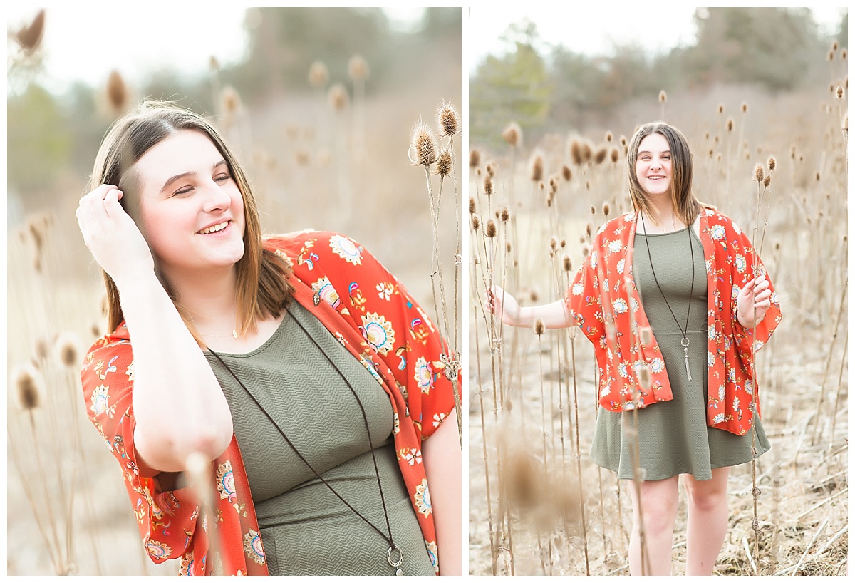 Senior girl in tall grasses photo by Simply Seeking Photography
