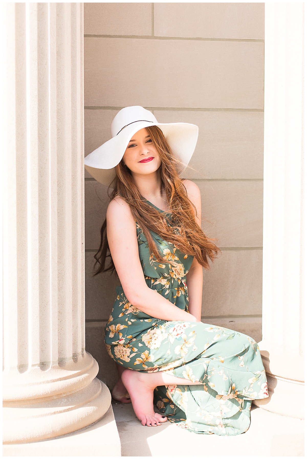 senior girl at Carnegie style library