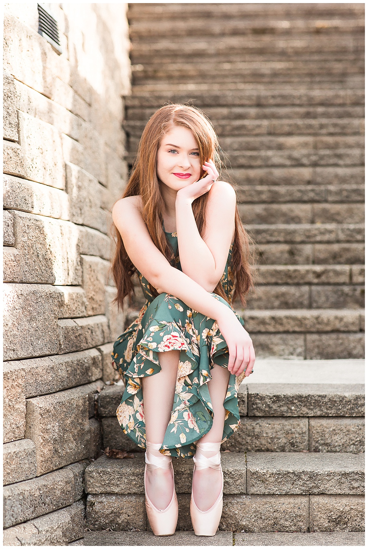 senior girl wearing pink pointe shoes
