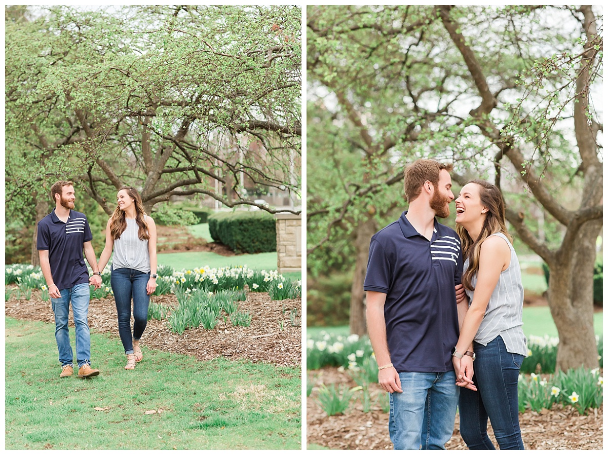 couple walking near daffodils