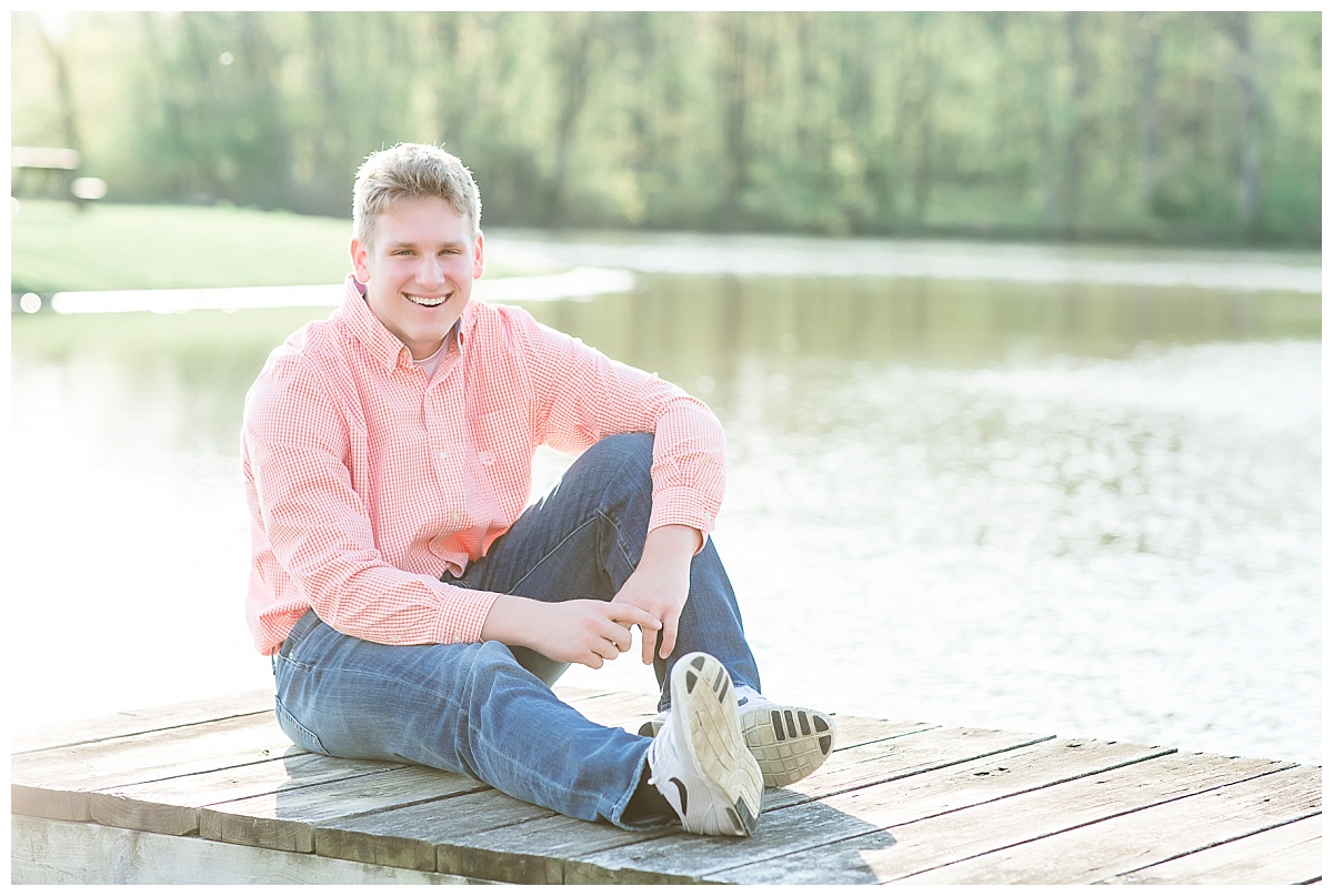 Senior guy sitting on dock photo by Simply Seeking Photography