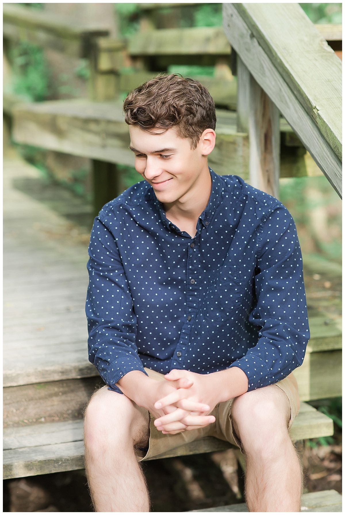Senior guy sitting on steps photo by Simply Seeking Photography