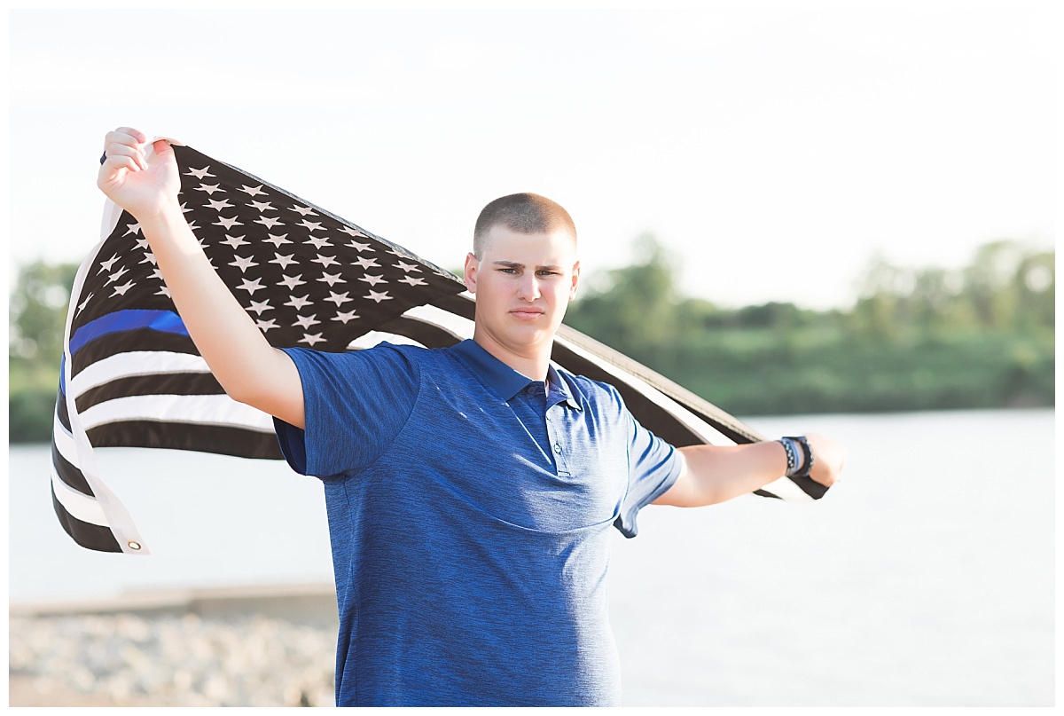 Senior guy with thin blue line flag photo by Simply Seeking Photography