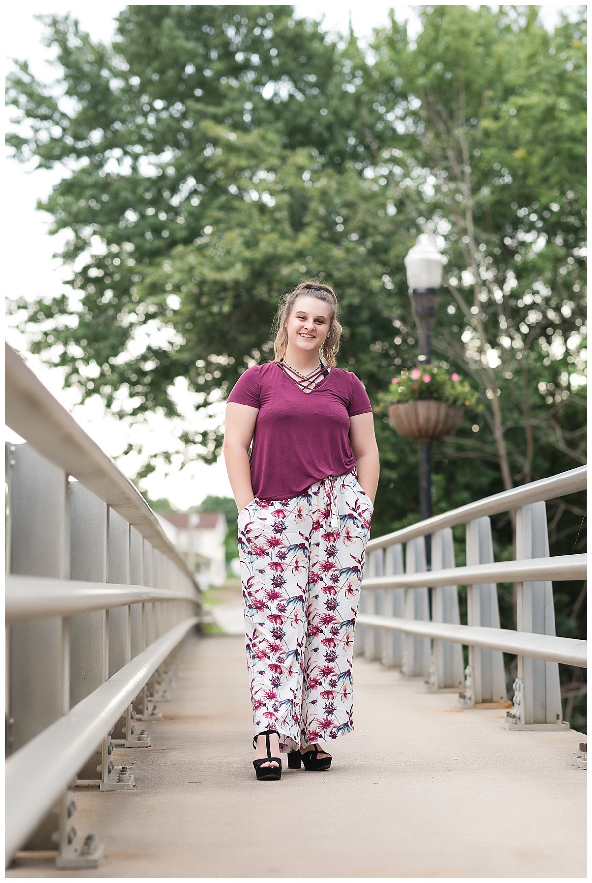 Senior girl walking on bridge photo by Simply Seeking Photography