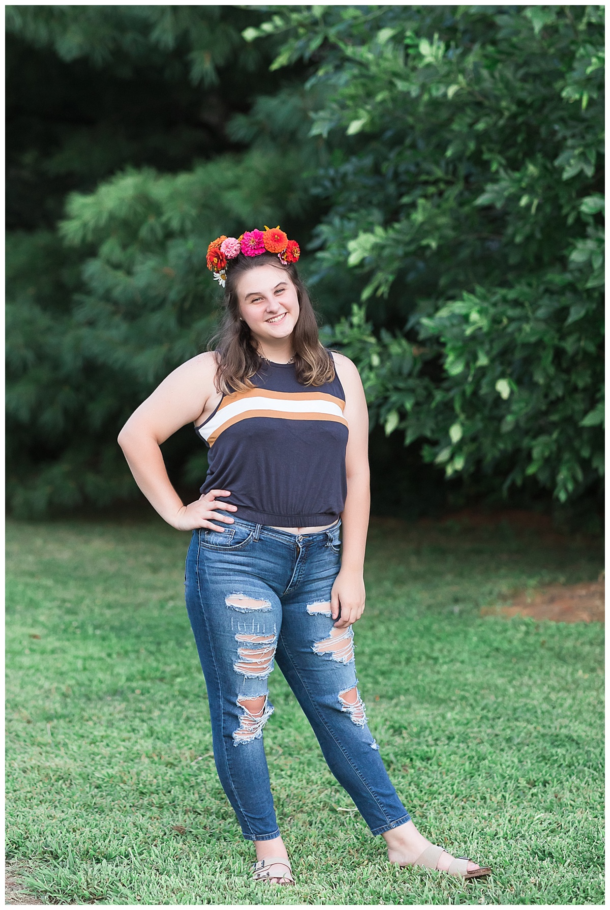 Senior girl wearing flower crown photo by Simply Seeking Photography