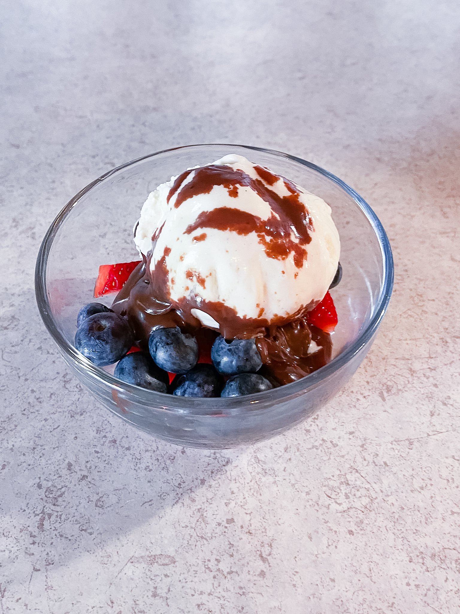 hot fudge sauce over ice cream