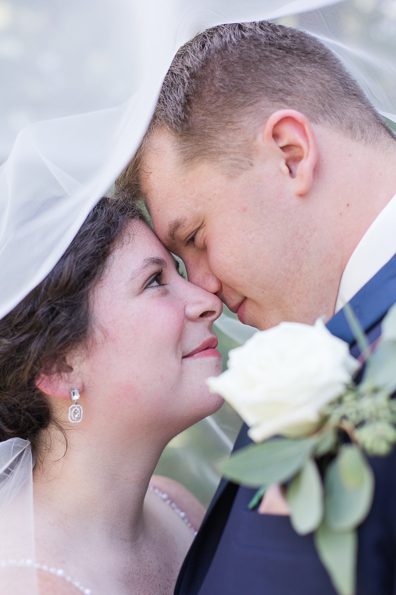 bride and groom in Hues of Rose and Navy Wedding
