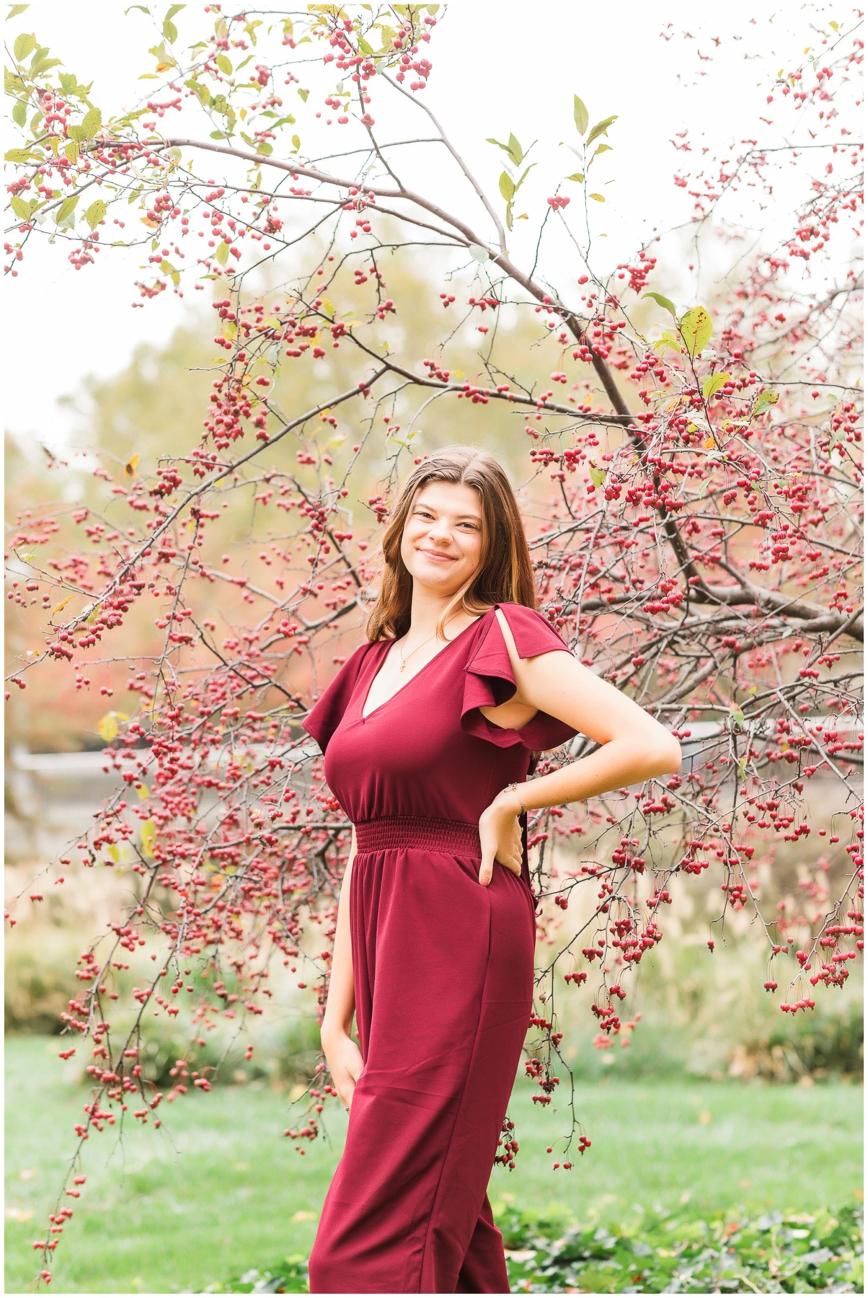 senior girl at Headwaters Park downtown Fort Wayne with fall foilage