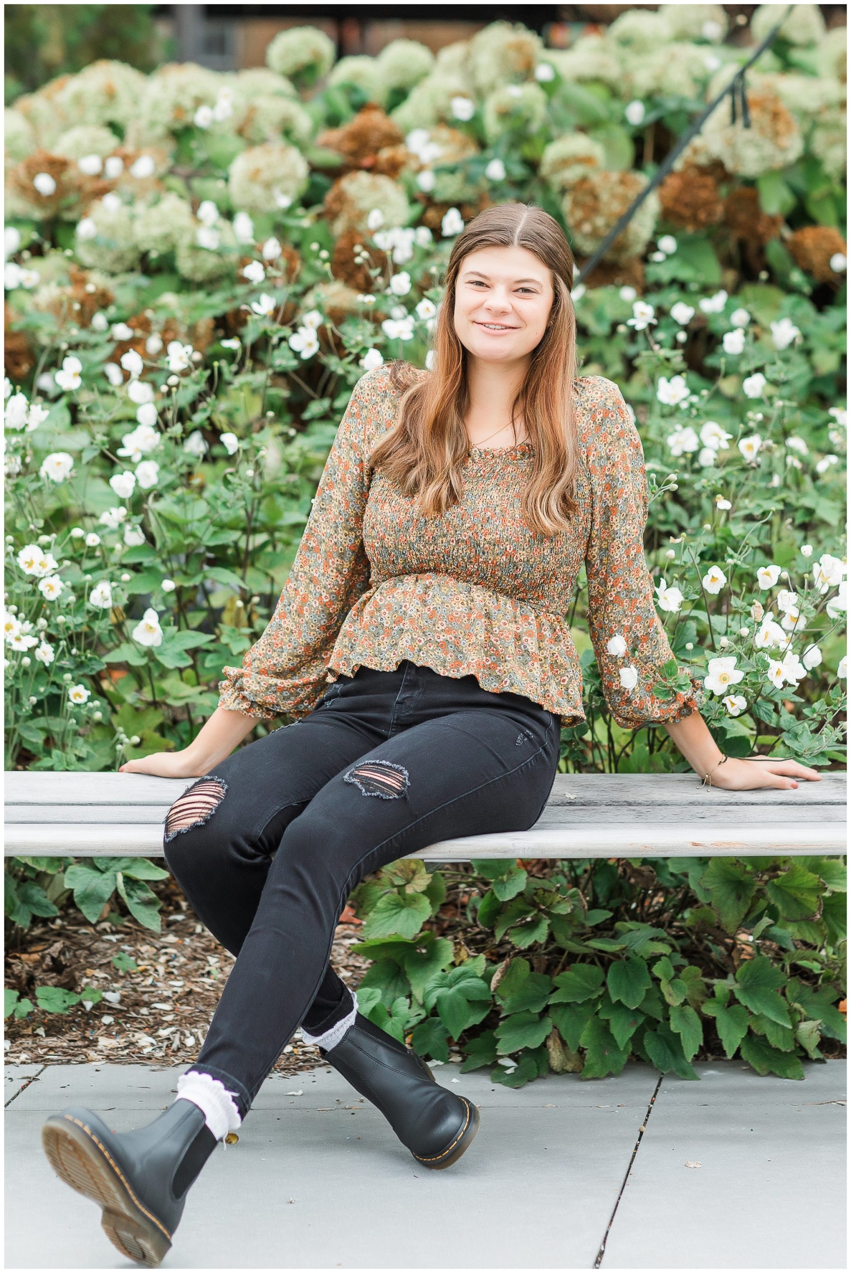 senior girl at Headwaters Park downtown Fort Wayne with fall foilage
