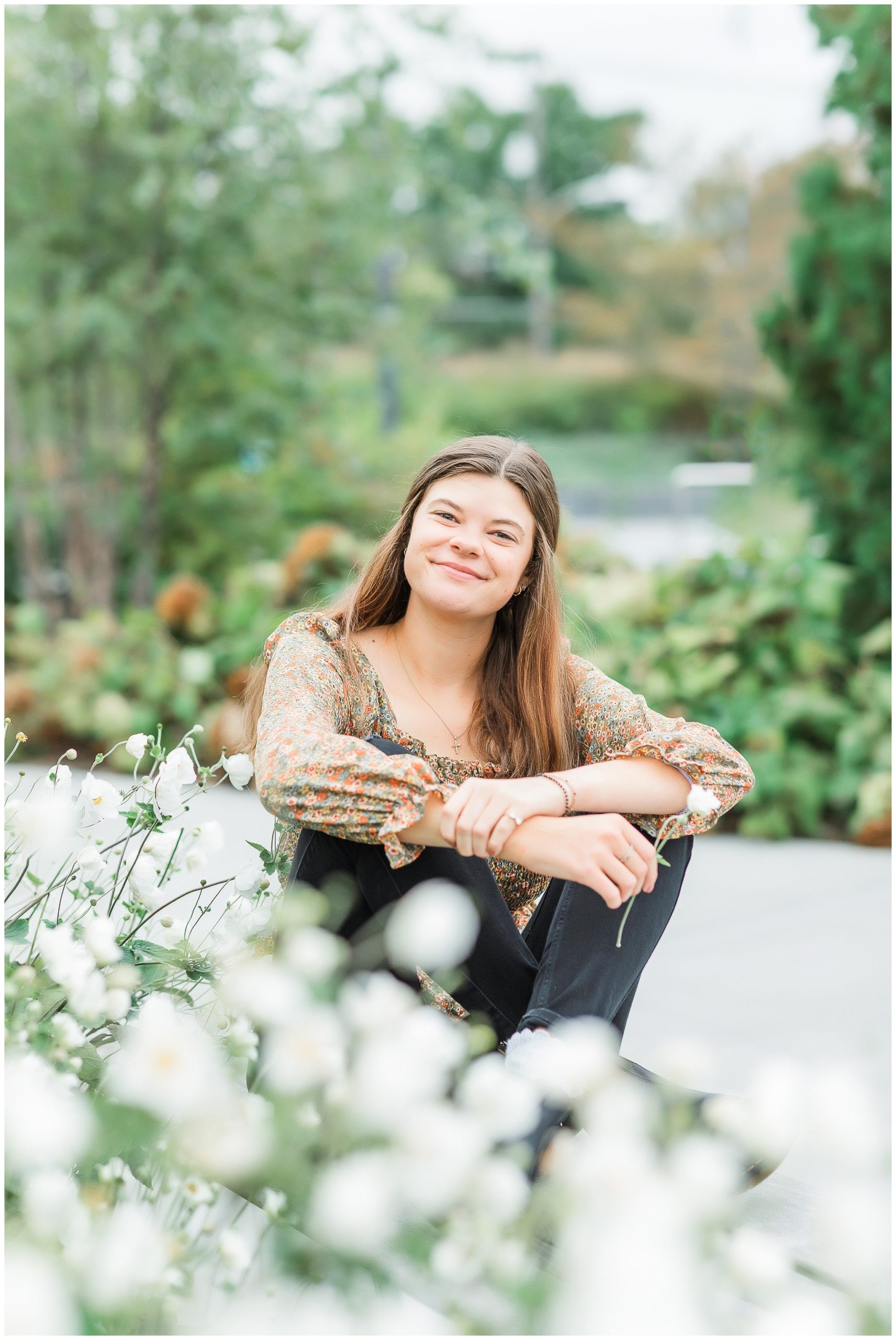 senior girl at Headwaters Park downtown Fort Wayne with fall foilage