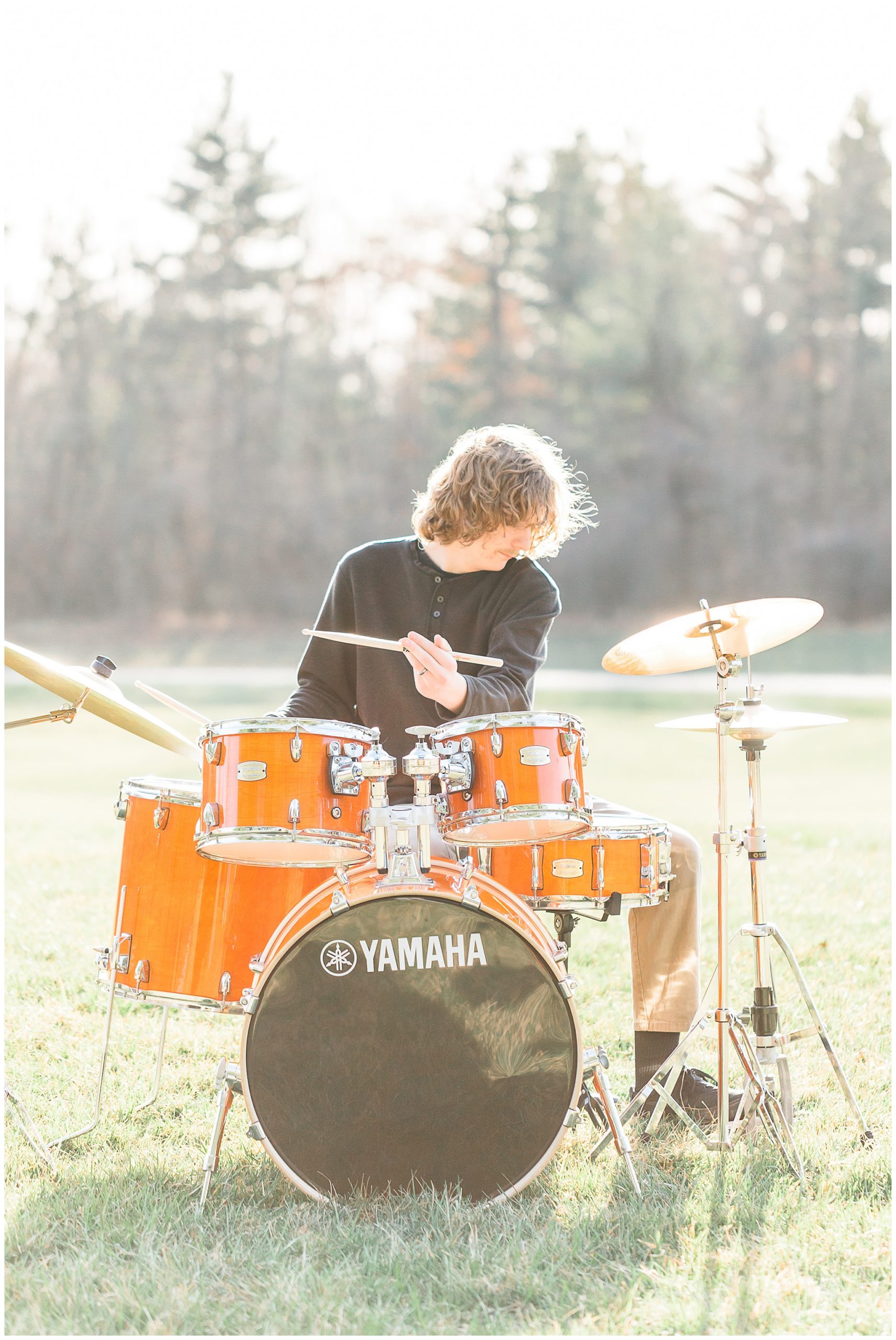 senior guy playing the drums
