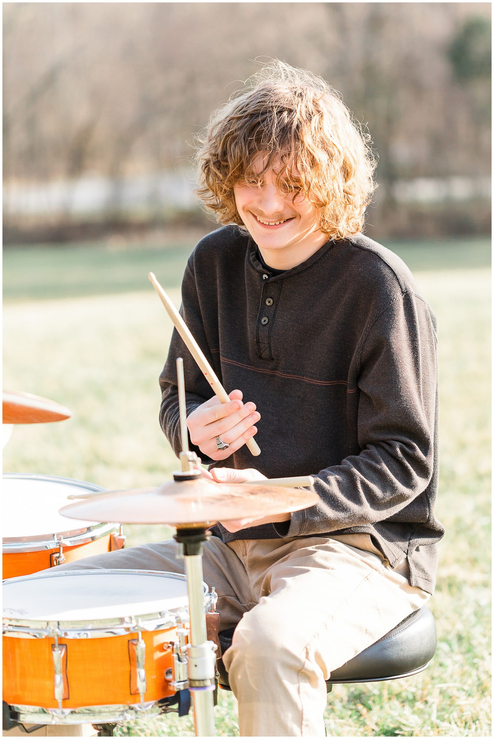 senior guy playing the drums